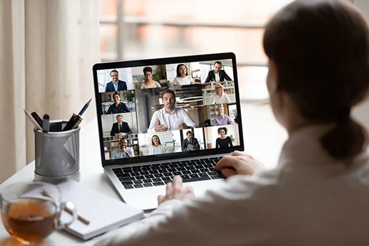 Woman in a meeting on her laptop