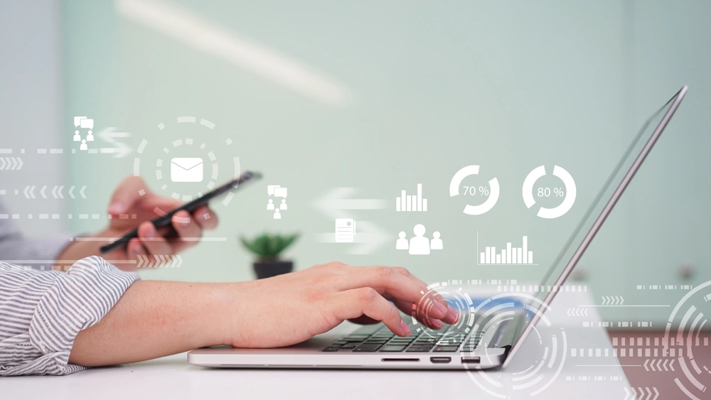 close up businessman hand typing on laptop for do work of company profit with with virtual dashboard statistic chart stock infographic